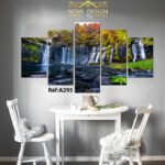 A white table with two chairs in a room with a nice interior and a picture on the wall