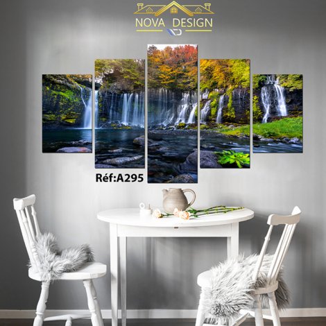 A white table with two chairs in a room with a nice interior and a picture on the wall